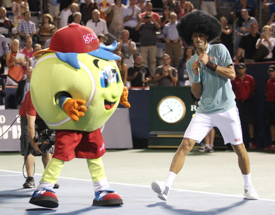 Novak Djokovic dons a wig and dances